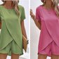 Ensemble deux pièces pour femme composé d'un haut asymétrique et d'un short, couleur unie