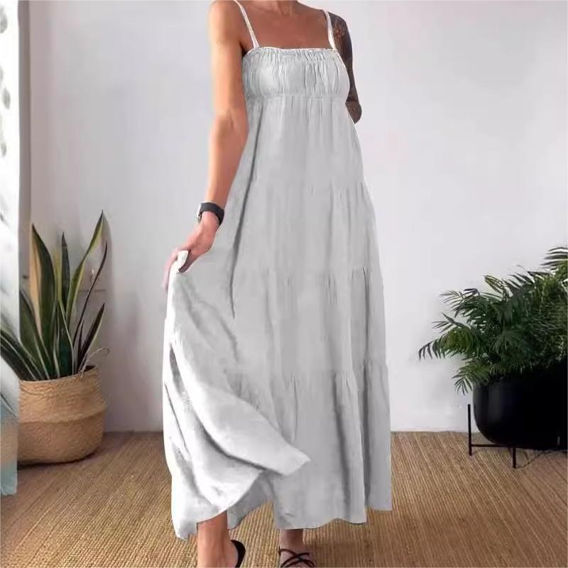 Robe à bretelles spaghetti plissée et respirante de couleur unie