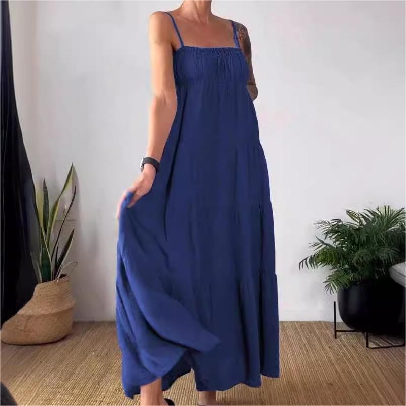 Robe à bretelles spaghetti plissée et respirante de couleur unie