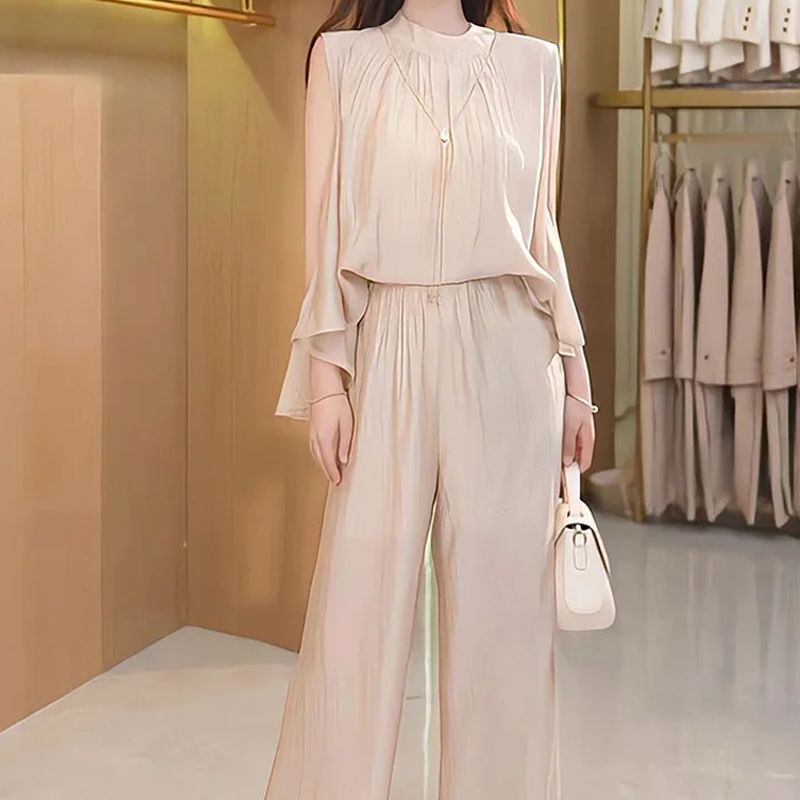 Ensemble 2 pièces fluide et chic pour femme avec haut sans manches et pantalon à jambes larges