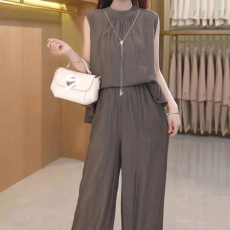 Ensemble 2 pièces fluide et chic pour femme avec haut sans manches et pantalon à jambes larges
