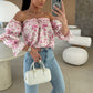 Blouse à épaules dénudées avec imprimé floral
