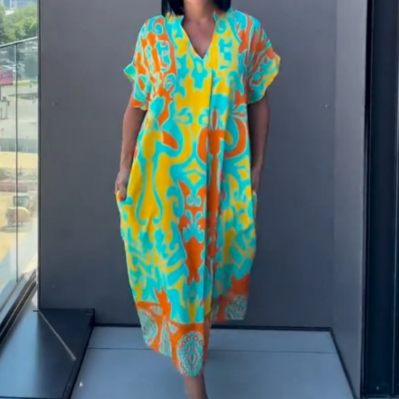 👗 50% DE RÉDUCTION ! 🌸 Robe décontractée élégante à imprimé et encolure V pour femmes – Tissu fluide, coupe flatteuse et parfaite pour le printemps ☀️