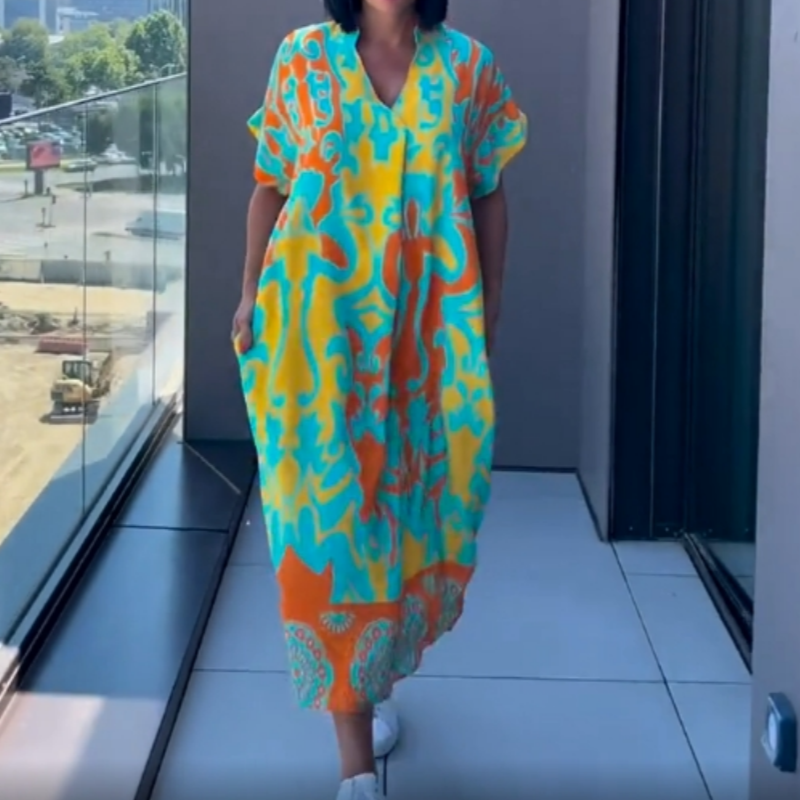 👗 50% DE RÉDUCTION ! 🌸 Robe décontractée élégante à imprimé et encolure V pour femmes – Tissu fluide, coupe flatteuse et parfaite pour le printemps ☀️