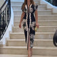 Robe longue moulante imprimée à encolure en V profonde