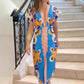 Robe longue moulante imprimée à encolure en V profonde