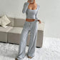 Ensemble haut ajusté en maille rayée et pantalon large