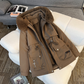 Manteau élégant isolé Parka avec cordon de taille