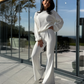 Ensemble 2 pièces pour femme composé d'un haut à manches longues côtelé et d'un pantalon évasé