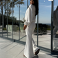 Ensemble 2 pièces pour femme composé d'un haut à manches longues côtelé et d'un pantalon évasé