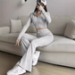 Ensemble deux pièces en tricot pour femme : haut court et pantalon évasé