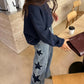 Pantalon en denim à jambes larges avec patch étoilé en strass