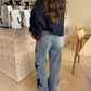 Pantalon en denim à jambes larges avec patch étoilé en strass
