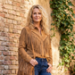 Veste en faux daim à pompons pour femme