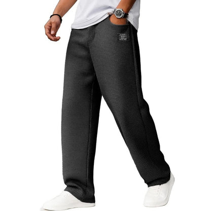 Pantalon long ample en maille gaufrée minimaliste