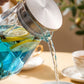 Élégant pichet en verre géométrique avec infuseur