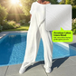 Ensemble femme composé d'un haut asymétrique à épaules dénudées et d'un pantalon