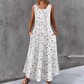 👗 Robe longue à fleurs sans manches pour femme — poches latérales, élégante et confortable 🌸