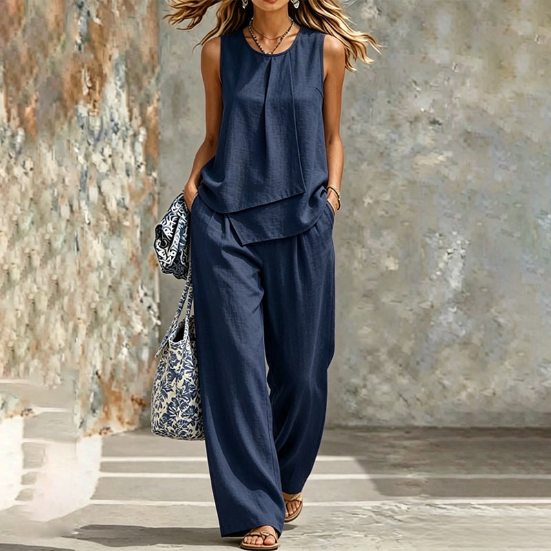 Ensemble femme composé d'un haut asymétrique et d'un pantalon à jambes larges