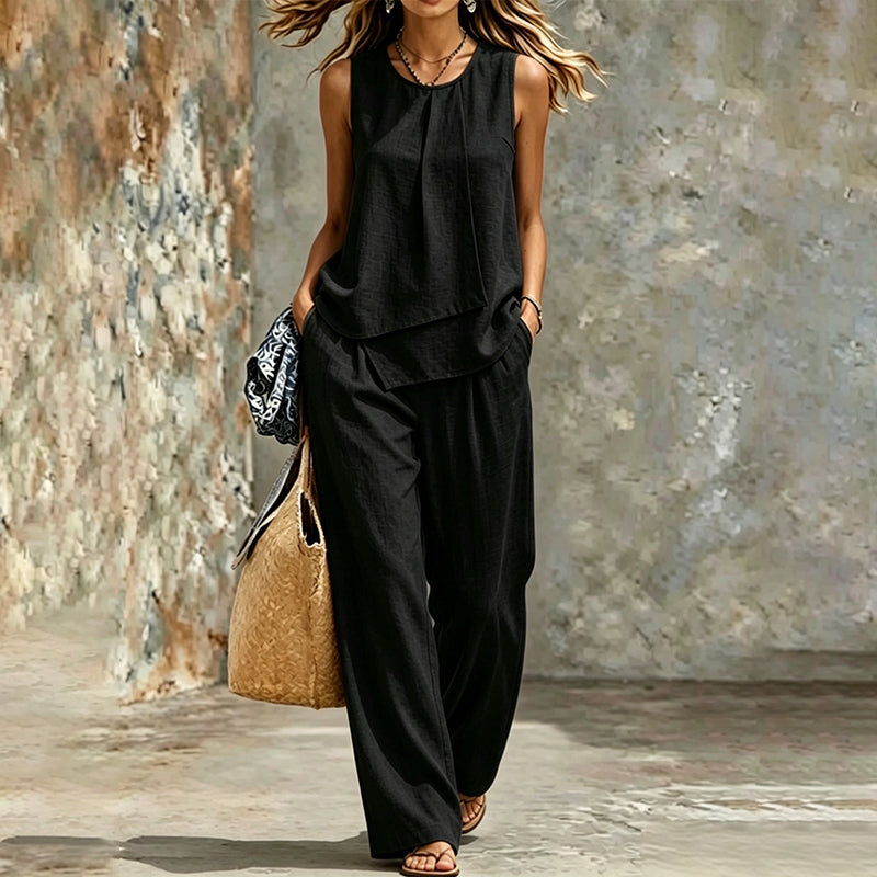 Ensemble femme composé d'un haut asymétrique et d'un pantalon à jambes larges
