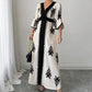 Robe longue élégante à col V imprimée pour femme