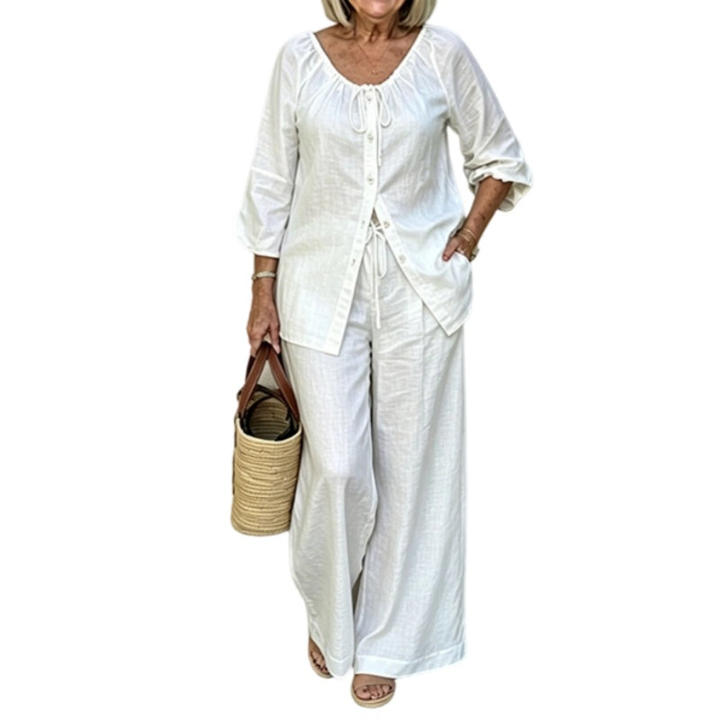 Ensemble femme composé d'un haut boutonné à cordon de serrage et d'un pantalon à jambes larges