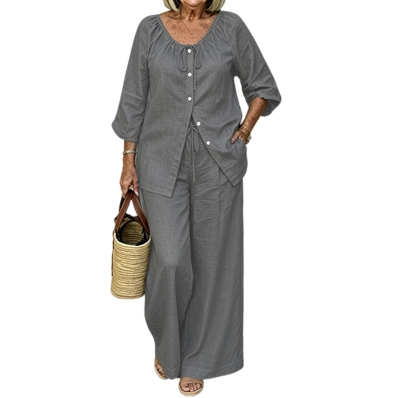 Ensemble femme composé d'un haut boutonné à cordon de serrage et d'un pantalon à jambes larges