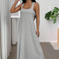 Robe longue sans manches style deux pièces avec découpes sur les côtés