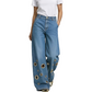 Jean large à découpes et œillets métalliques pour femme