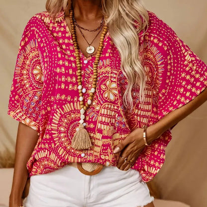 👚 50% DE RÉDUCTION 🌸 Top imprimé col V, manches dolman – Coupe large & style vacances – Léger, fluide – parfait pour l’été ou les voyages – look bohème et confortable ☀️🌿✨
