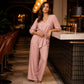Ensemble pour femme composé d'un haut à col en V noué sur le devant et d'un pantalon à jambes larges