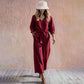 Ensemble pour femme composé d'un haut à col en V noué sur le devant et d'un pantalon à jambes larges