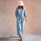 Ensemble pour femme composé d'un haut à col en V noué sur le devant et d'un pantalon à jambes larges