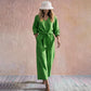 Ensemble pour femme composé d'un haut à col en V noué sur le devant et d'un pantalon à jambes larges