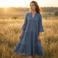 Robe midi évasée en tissu texturé uni