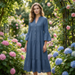 Robe midi évasée en tissu texturé uni