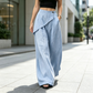 Pantalon pour femme à entrejambe asymétrique et jambes larges