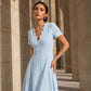 Robe femme à col en V festonné et à œillets