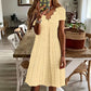 Robe femme à col en V festonné et à œillets