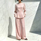 Ensemble élégant pour femme composé d'un haut à manches bouffantes et d'un pantalon à jambes larges