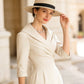 Robe fourreau élégante à col revers avec poches