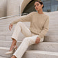 Pull en maille torsadée à col rond pour femme