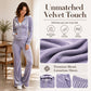 Ensemble femme composé d'un sweat à capuche zippé en velours et d'un pantalon évasé