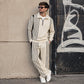 Ensemble de survêtement pour homme composé d'un sweat-shirt à demi-zip imprimé et d'un pantalon
