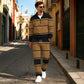 Ensemble de survêtement pour homme composé d'un sweat-shirt à demi-zip imprimé et d'un pantalon
