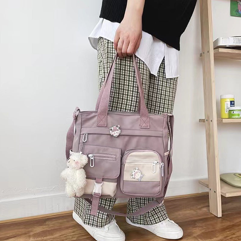 Joli sac à bandoulière pour adolescentes avec 2 écussons