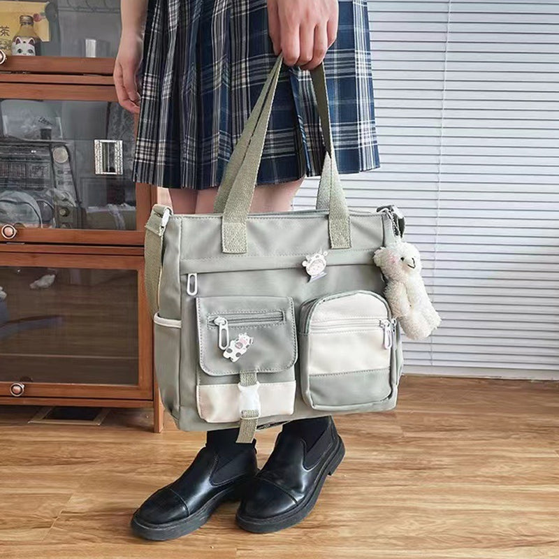 Joli sac à bandoulière pour adolescentes avec 2 écussons