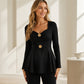 Haut femme à col en V et coupe peplum avec motifs de fleurs