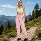 Pantalon de plein air imperméable pour femme avec poches zippées