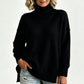 Pull en maille col roulé ample pour femme